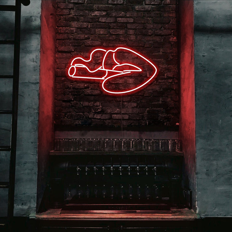 red smoking lips neon sign hanging on bar wall
