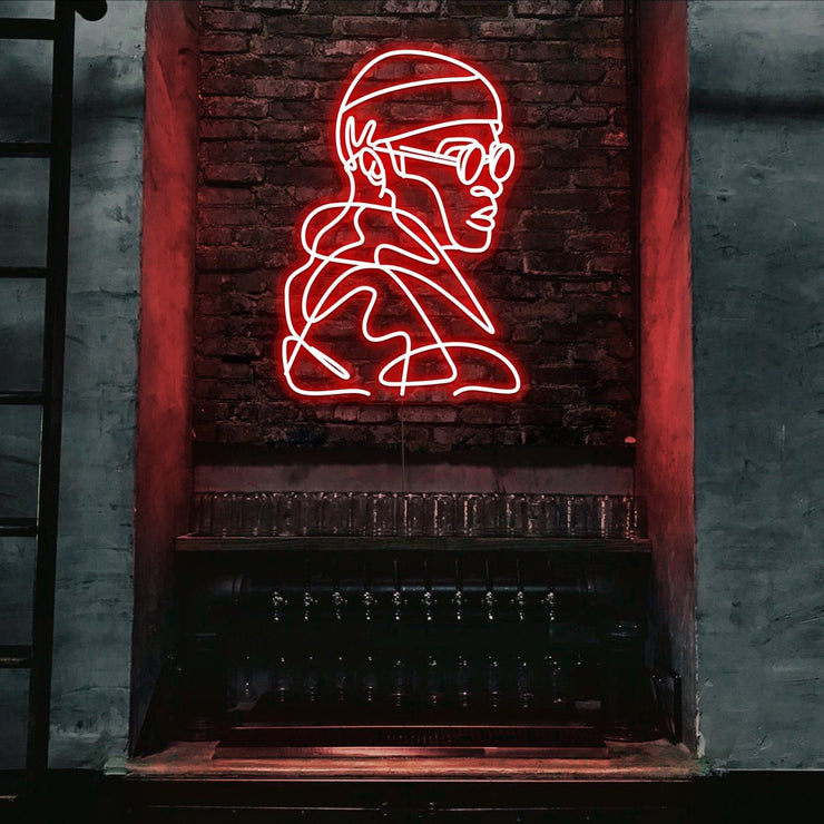 red street cred neon sign hanging on bar wall
