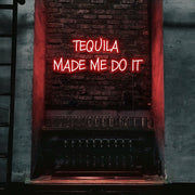 red tequila made me do it neon sign hanging on bar wall