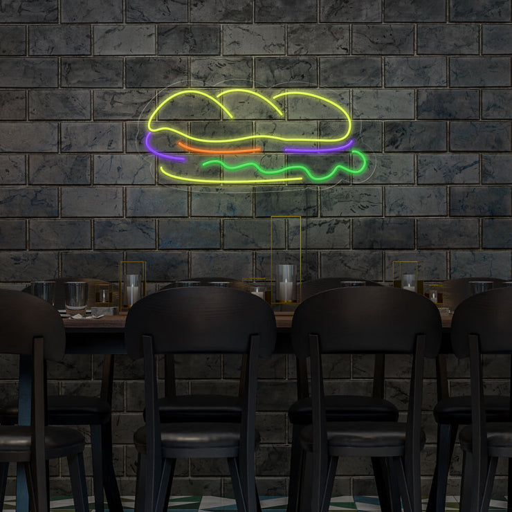 sandwich neon sign hanging on restaurant wall