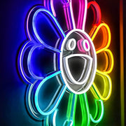 close up of takashi murakami flower neon sign