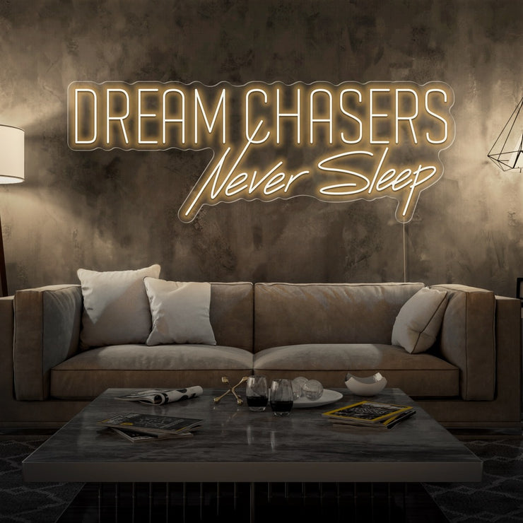 warm white dream chasers never sleep neon sign hanging on living room wall
