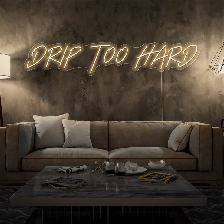 warm white drip too hard neon sign hanging on living room wall