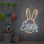warm white easter bunny neon sign hanging on wall