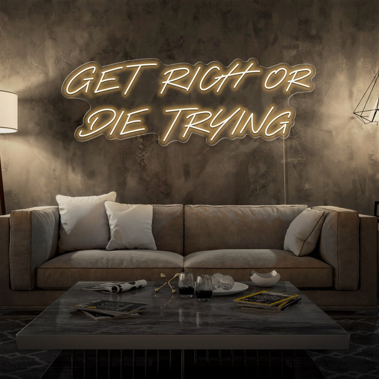 warm white get rich or die trying neon sign hanging on living room wall