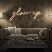 warm white glow up neon sign hanging on living room wall