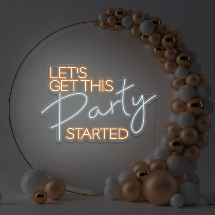 warm white lets get this party started neon sign hanging in gold hoop frame
