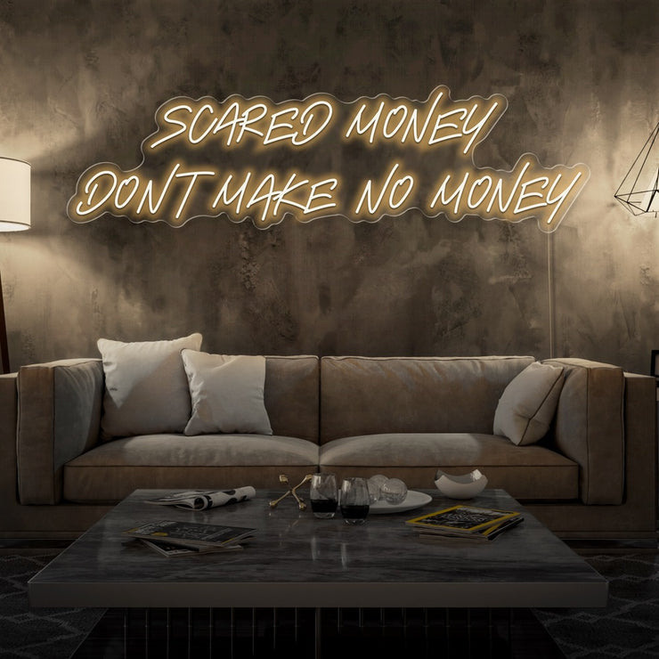 warm white scared money dont make no money neon sign hanging on living room wall