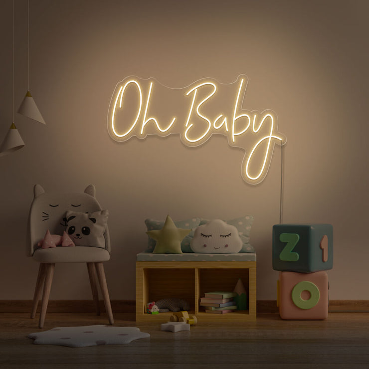 warm white oh baby neon sign hanging on kids bedroom wall