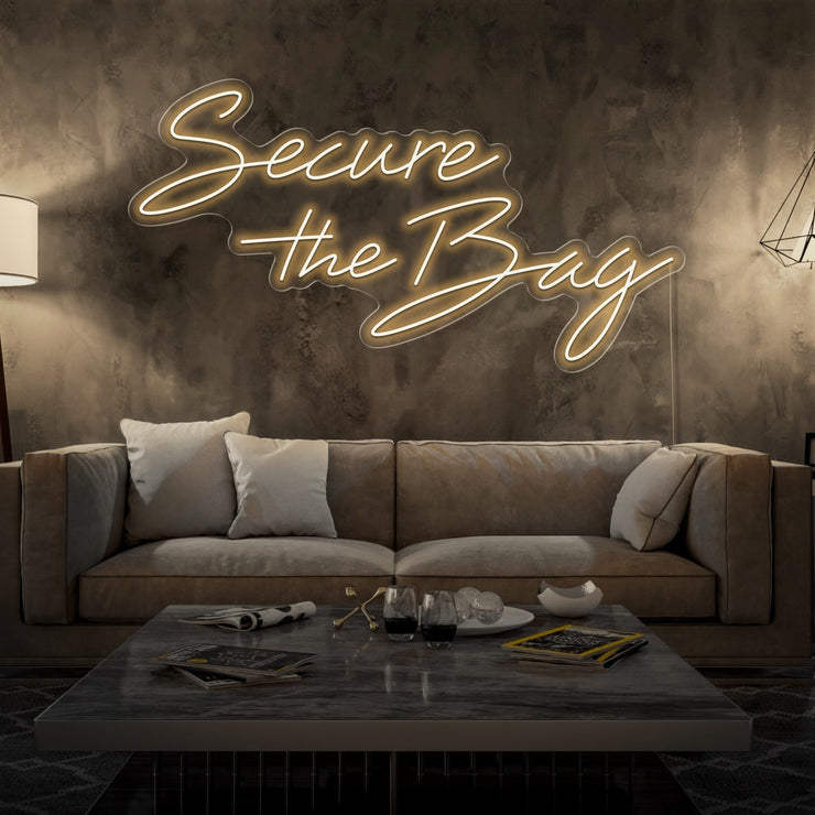 warm white secure the bag neon sign hanging on living room wall