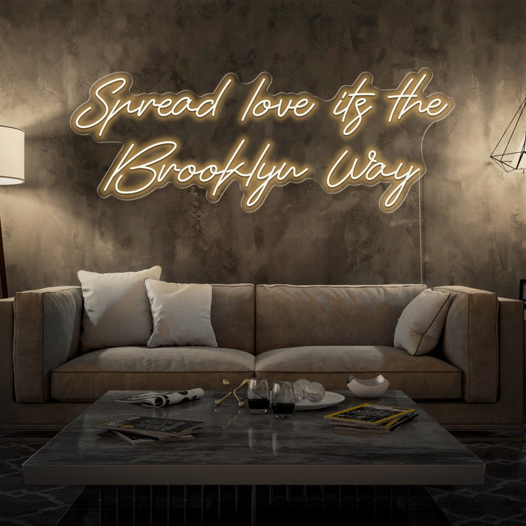 warm white spread love the brooklyn way neon sign hanging on living room wall