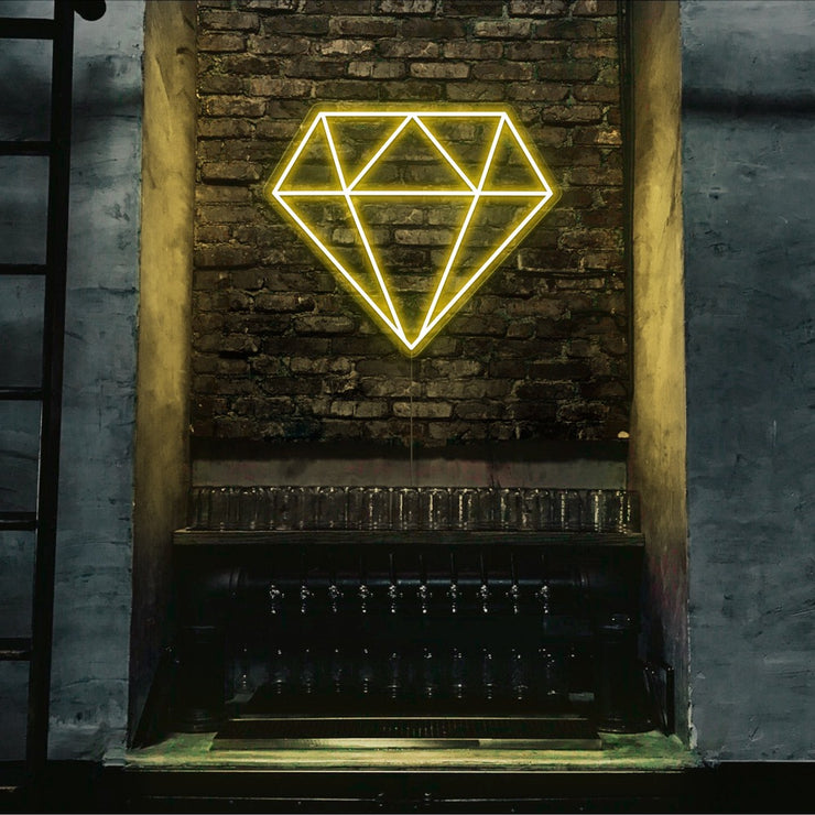 yellow diamond neon sign hanging on bar wall
