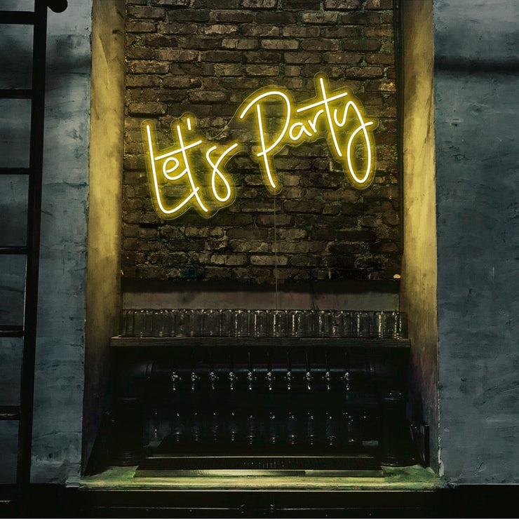 yellow lets party neon sign hanging on bar wall