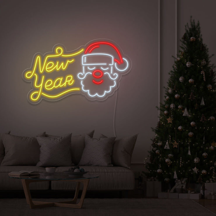 yellow new year santa neon sign hanging on living room wall