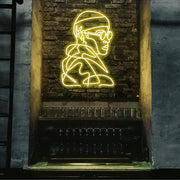 yellow street cred neon sign hanging on bar wall